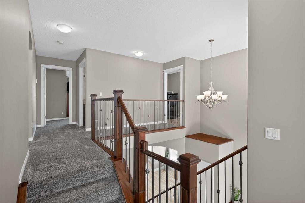 385 Rainbow Falls Way, Chestermere, AB - Indoor Photo Showing Bedroom