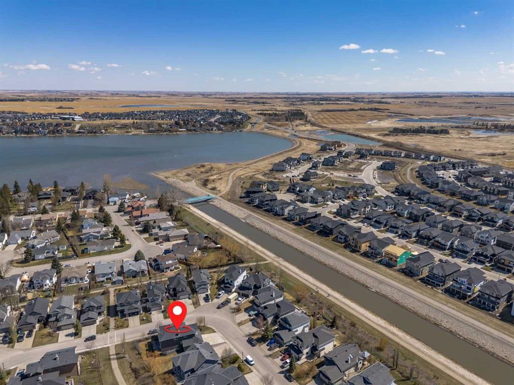 385 Rainbow Falls Way, Chestermere, AB - Outdoor With Body Of Water With View