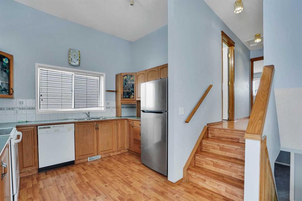 193 Martindale Drive Ne, Calgary, AB - Indoor Photo Showing Kitchen With Double Sink