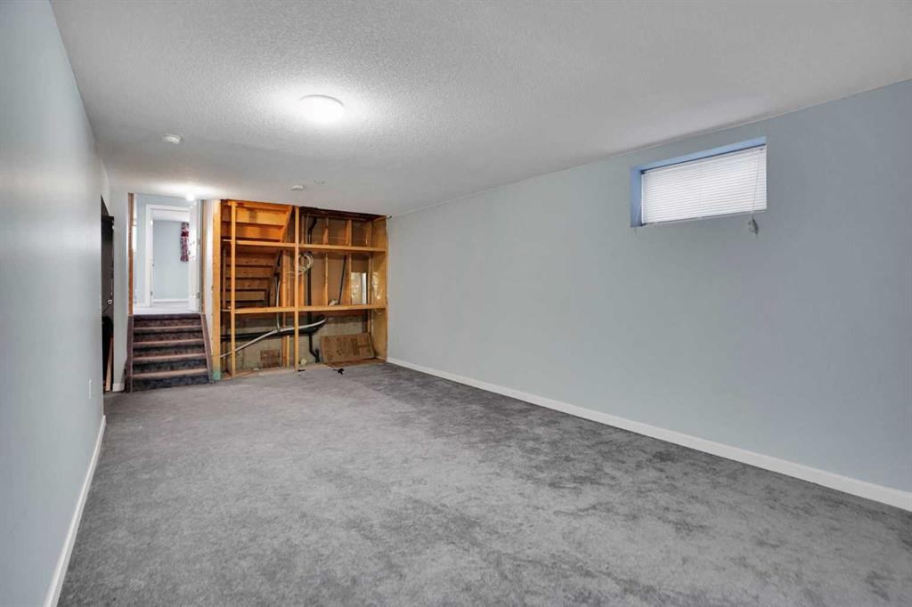 193 Martindale Drive Ne, Calgary, AB - Indoor Photo Showing Other Room