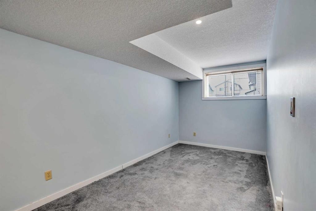 193 Martindale Drive Ne, Calgary, AB - Indoor Photo Showing Other Room