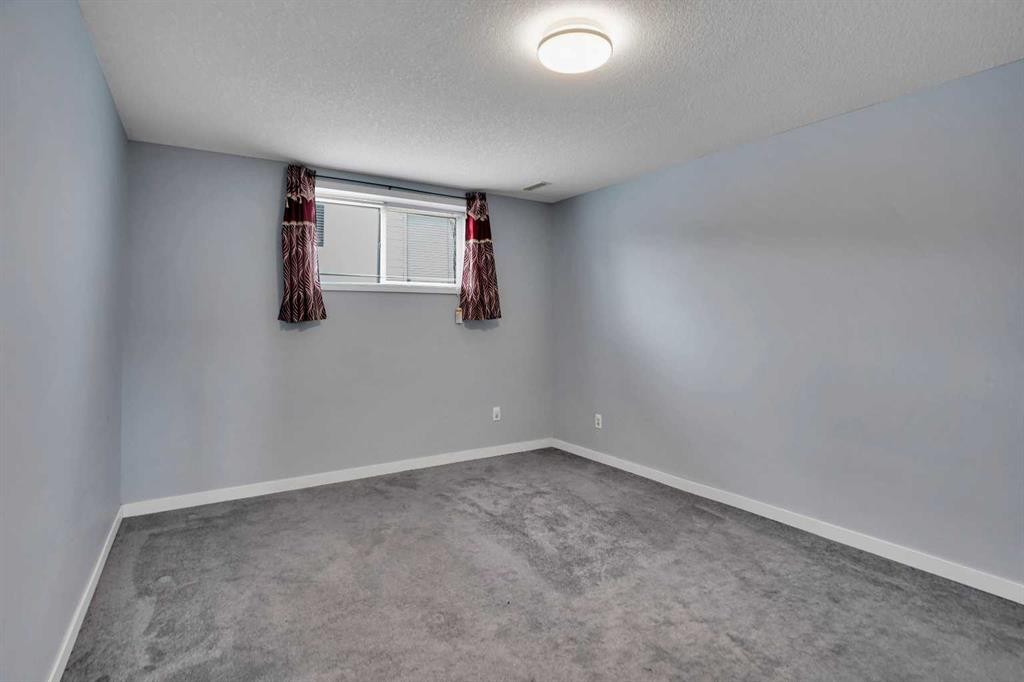193 Martindale Drive Ne, Calgary, AB - Indoor Photo Showing Other Room