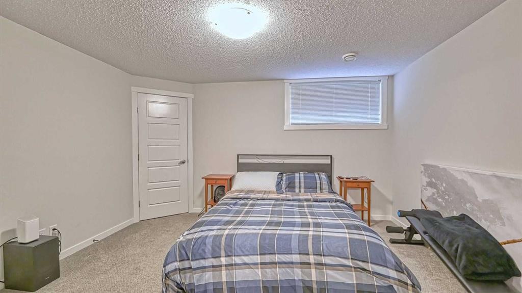 417 Cranbrook Square Se, Calgary, AB - Indoor Photo Showing Bedroom