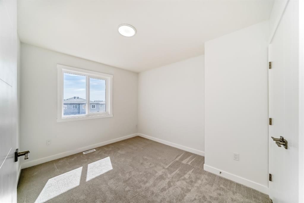 324 Cornerbrook Drive Ne, Calgary, AB - Indoor Photo Showing Other Room
