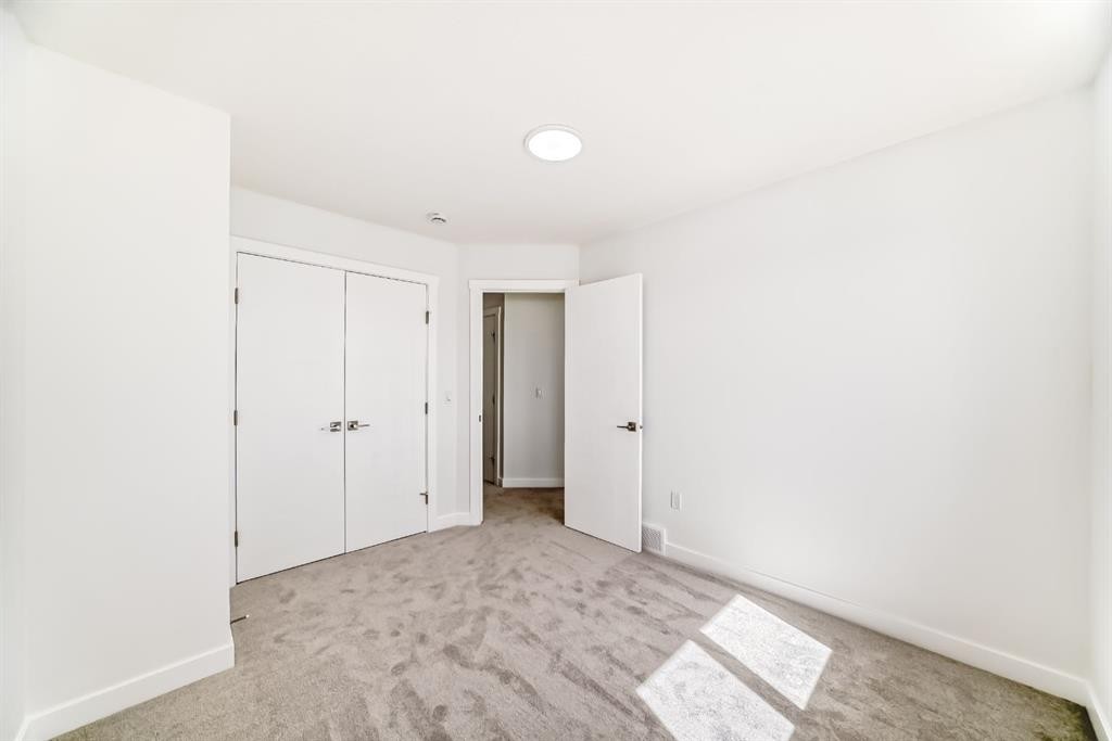 324 Cornerbrook Drive Ne, Calgary, AB - Indoor Photo Showing Other Room