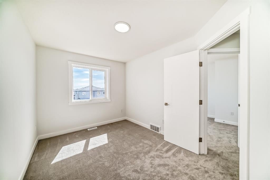 324 Cornerbrook Drive Ne, Calgary, AB - Indoor Photo Showing Other Room