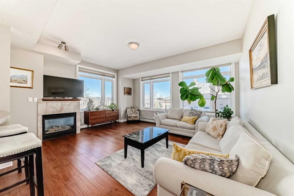 3506-24 Hemlock Crescent Sw, Calgary, AB - Indoor Photo Showing Living Room With Fireplace