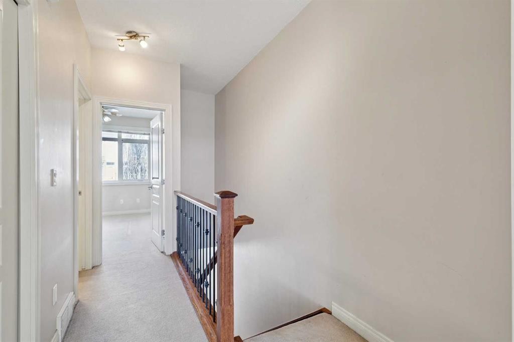 14-169 Rockyledge View Nw, Calgary, AB - Indoor Photo Showing Other Room