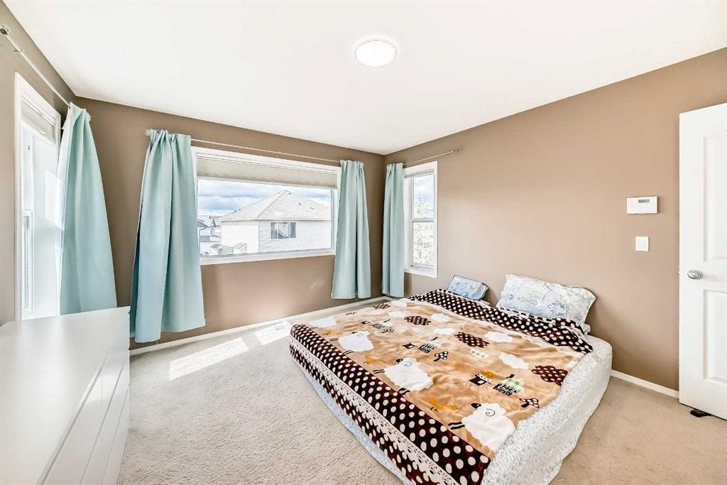 250 Royal Birch Way Nw, Calgary, AB - Indoor Photo Showing Bedroom