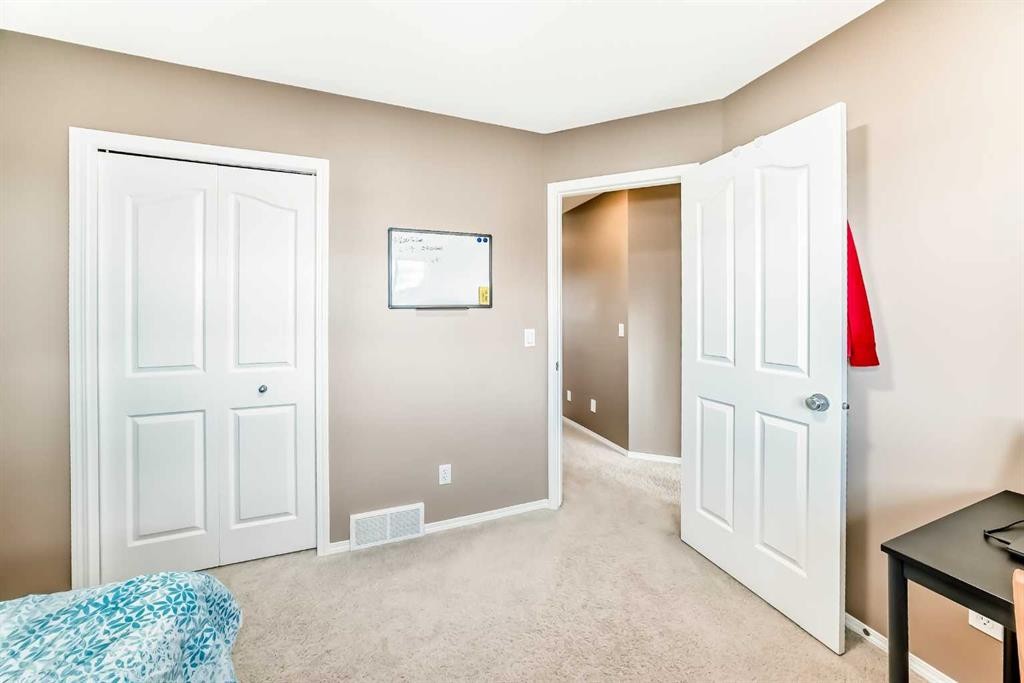 250 Royal Birch Way Nw, Calgary, AB - Indoor Photo Showing Bedroom