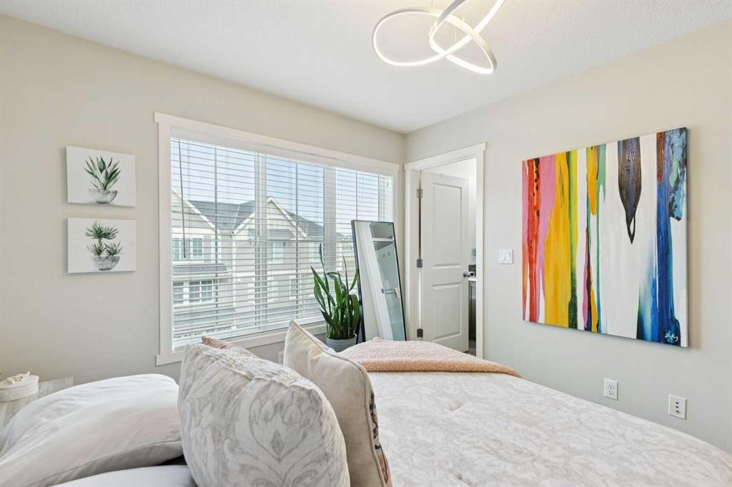 46 Kinlea Common Nw, Calgary, AB - Indoor Photo Showing Bedroom