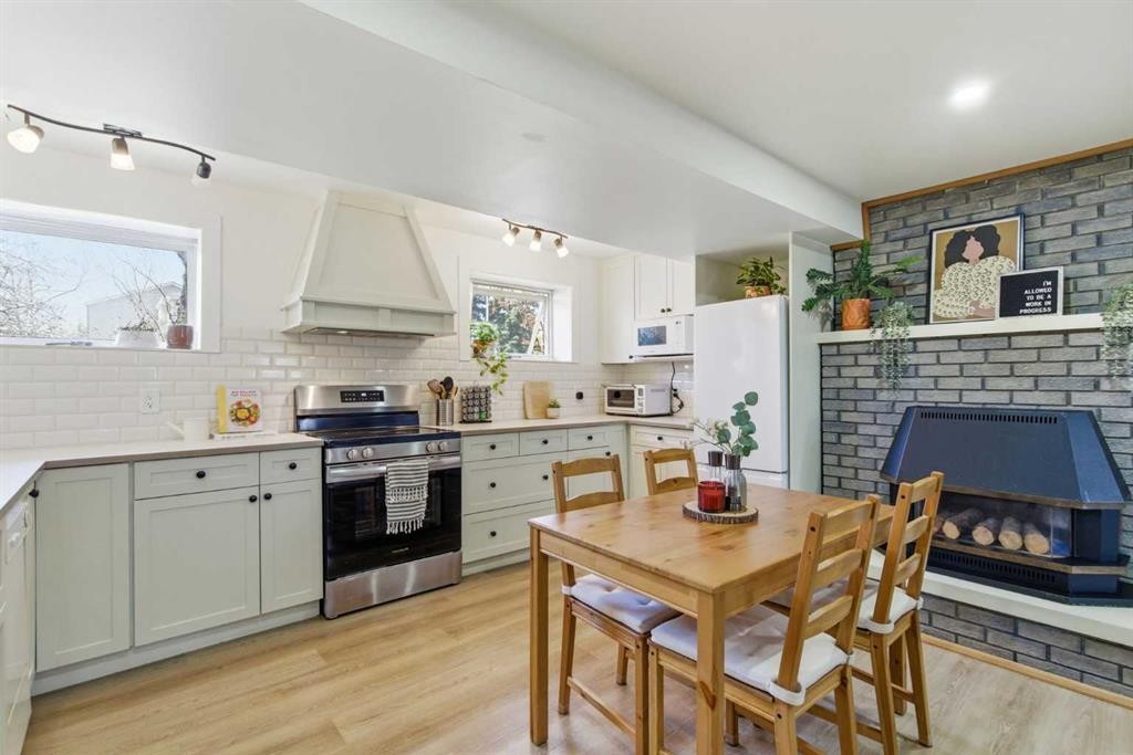 14767 Deer Ridge Drive Se, Calgary, AB - Indoor Photo Showing Other Room With Fireplace