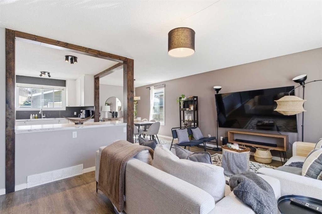 14767 Deer Ridge Drive Se, Calgary, AB - Indoor Photo Showing Living Room With Fireplace