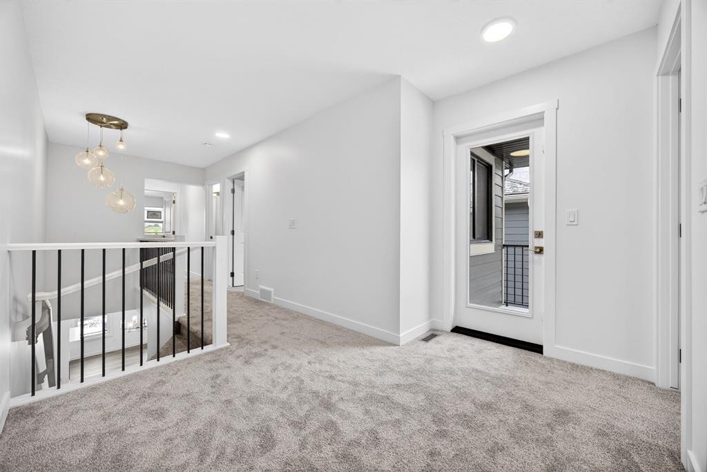 338 Alpine Boulevard Sw, Calgary, AB - Indoor Photo Showing Other Room