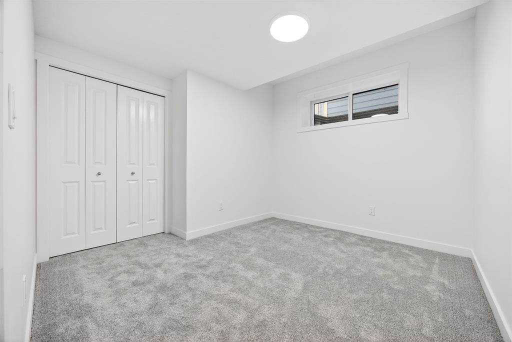 338 Alpine Boulevard Sw, Calgary, AB - Indoor Photo Showing Other Room