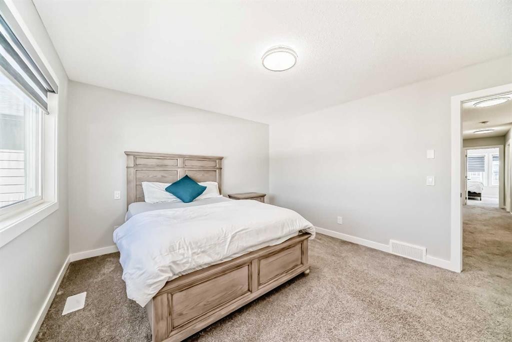 95 Cornerbrook Common Ne, Calgary, AB - Indoor Photo Showing Bedroom
