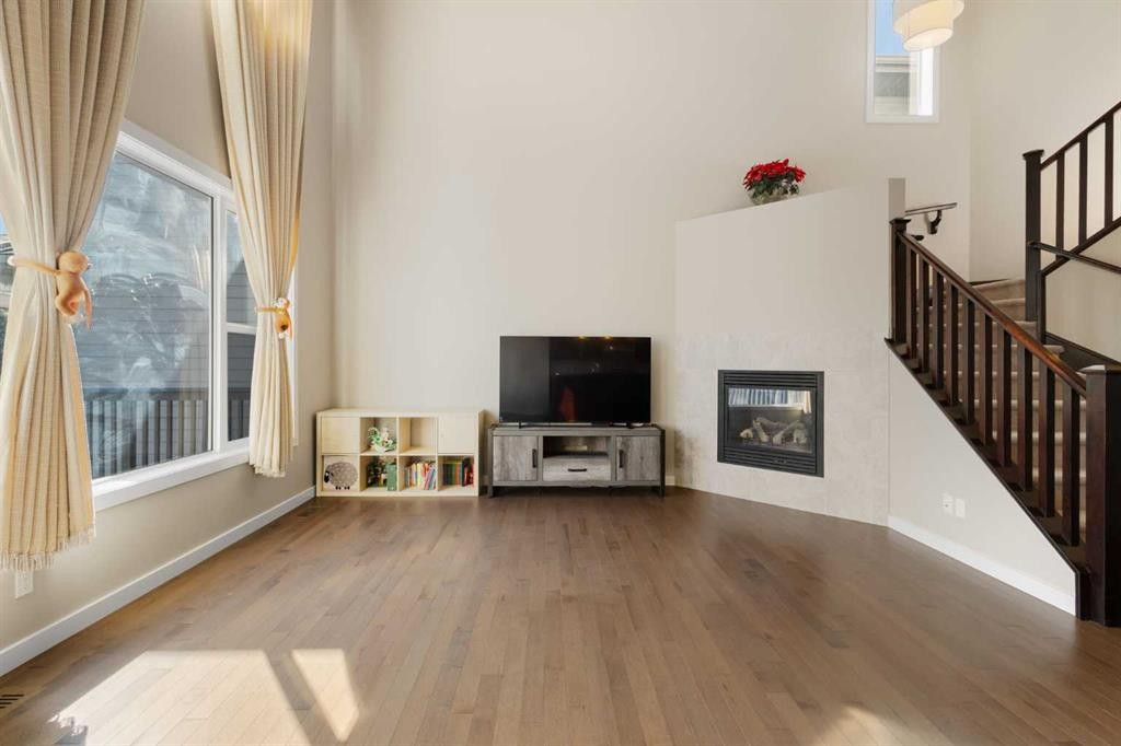 91 Panamount Common Nw, Calgary, AB - Indoor With Fireplace