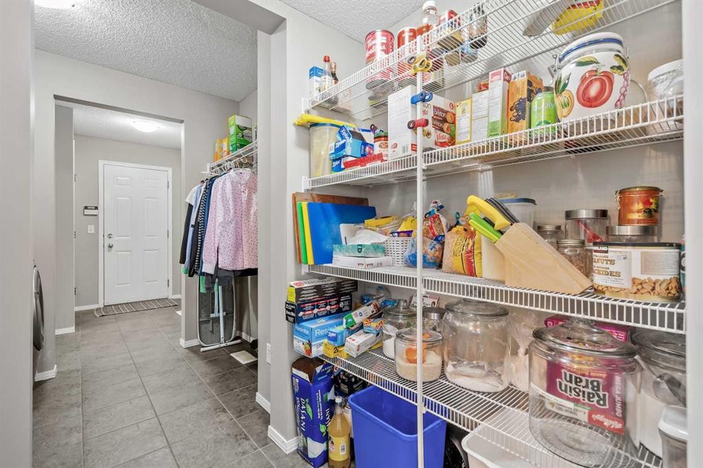 8 Chapalina Rise Se, Calgary, AB - Indoor With Storage