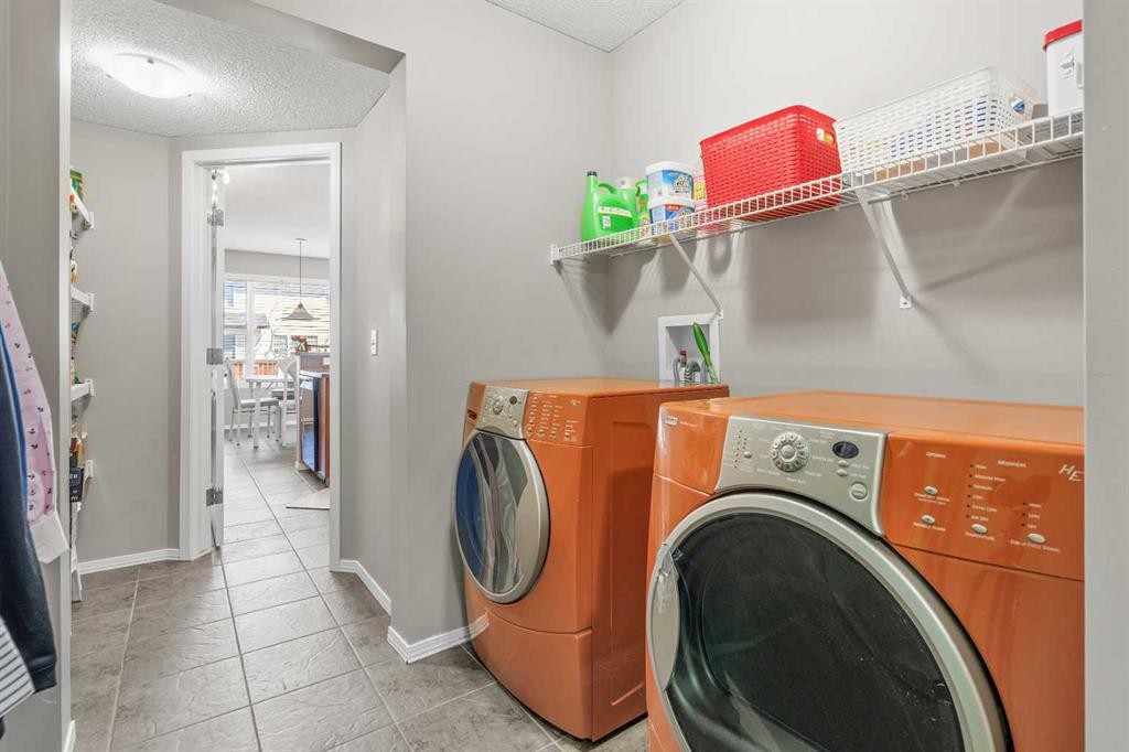 8 Chapalina Rise Se, Calgary, AB - Indoor Photo Showing Laundry Room