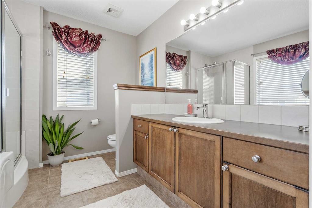 8 Chapalina Rise Se, Calgary, AB - Indoor Photo Showing Bathroom