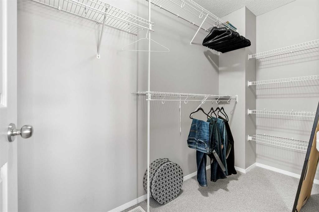 8 Chapalina Rise Se, Calgary, AB - Indoor With Storage
