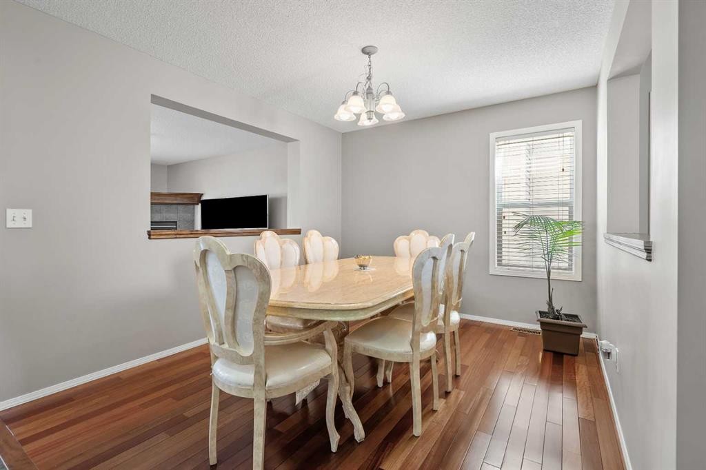 8 Chapalina Rise Se, Calgary, AB - Indoor Photo Showing Dining Room