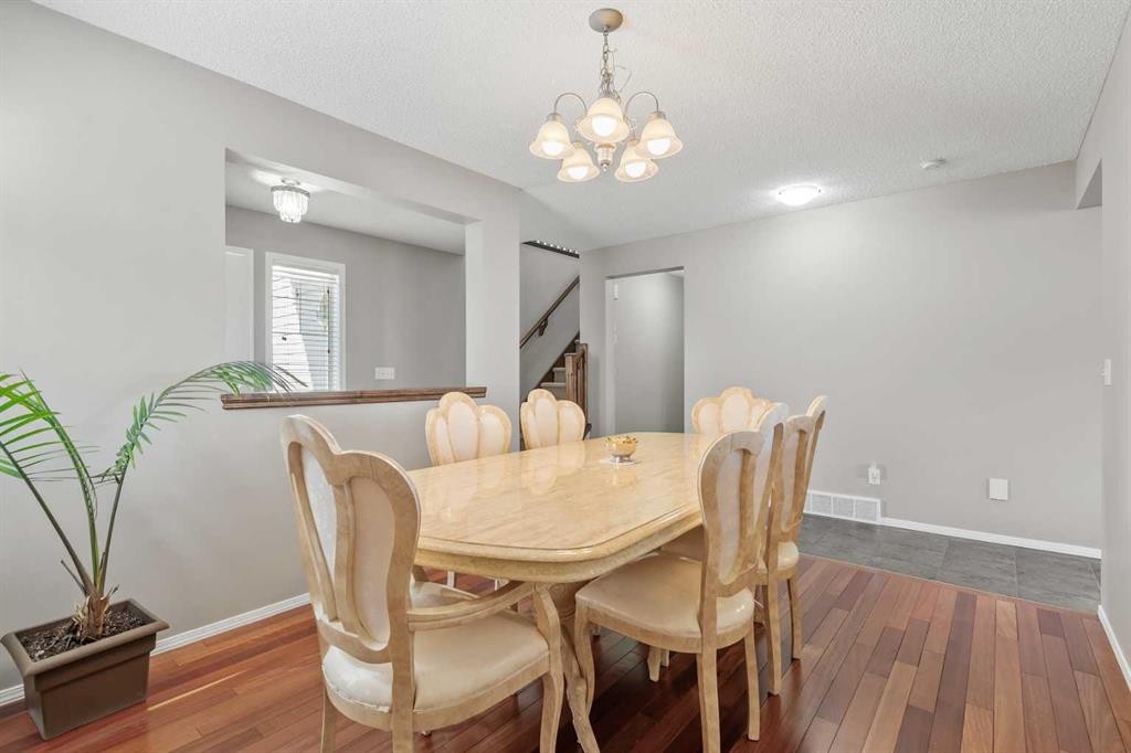 8 Chapalina Rise Se, Calgary, AB - Indoor Photo Showing Dining Room