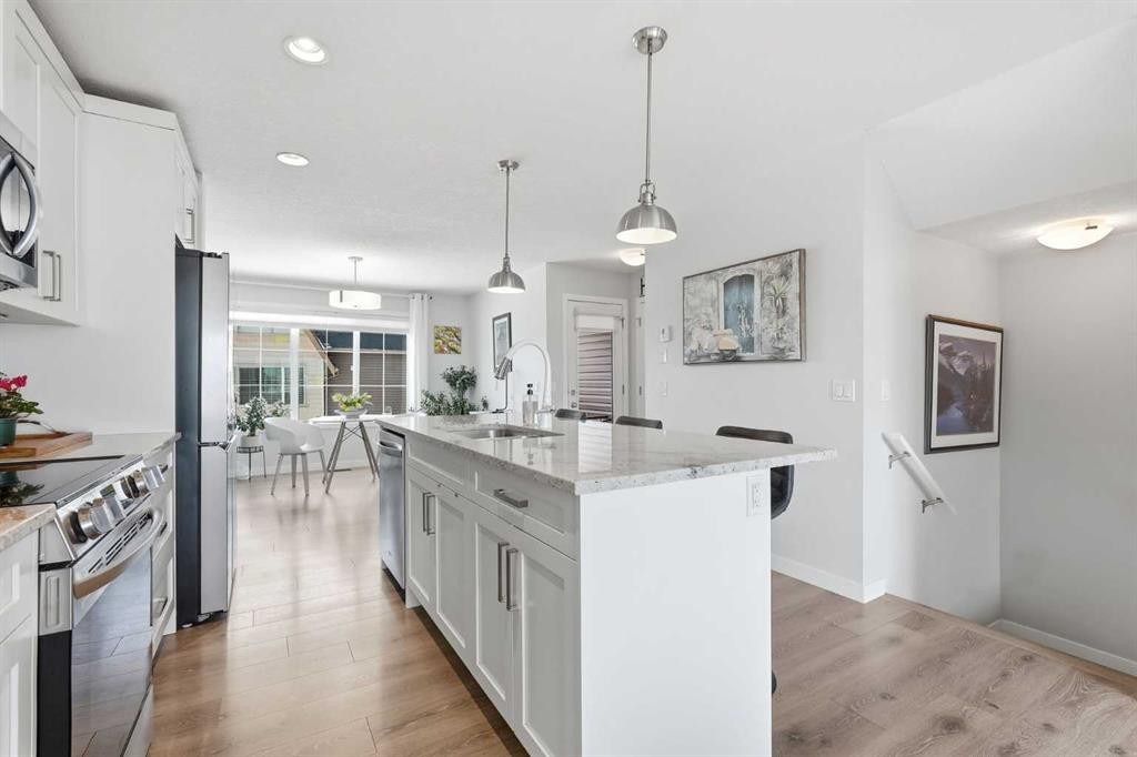 2202-250 Fireside View, Cochrane, AB - Indoor Photo Showing Kitchen With Upgraded Kitchen