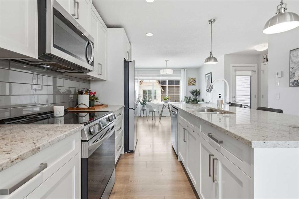 2202-250 Fireside View, Cochrane, AB - Indoor Photo Showing Kitchen With Upgraded Kitchen