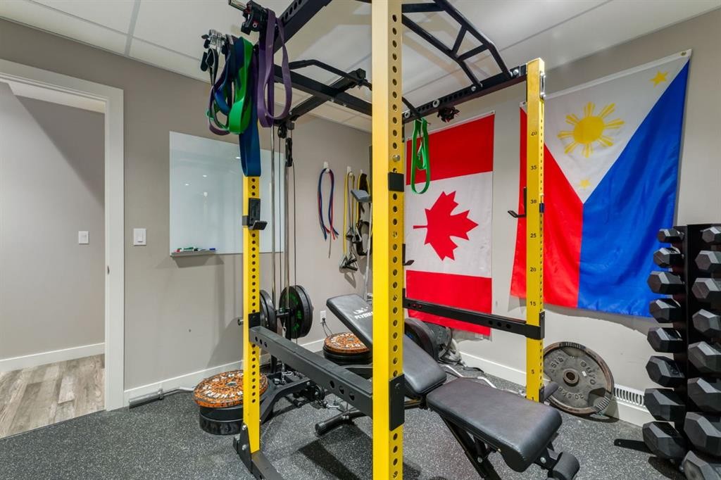 39 Cranbrook Crescent Se, Calgary, AB - Indoor Photo Showing Gym Room