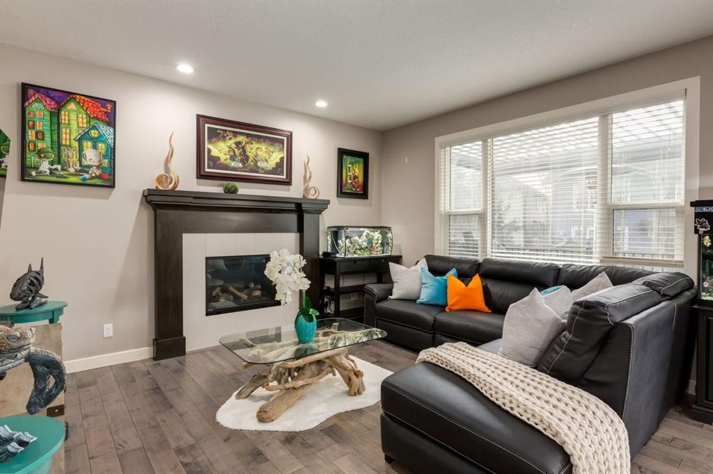 39 Cranbrook Crescent Se, Calgary, AB - Indoor Photo Showing Living Room With Fireplace