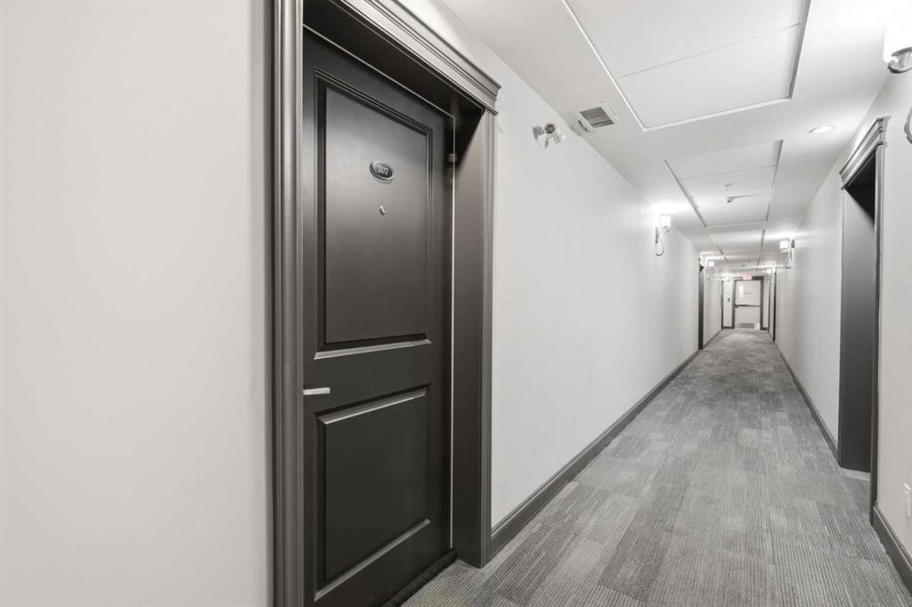 207-39 Quarry Gate Se, Calgary, AB - Indoor Photo Showing Other Room