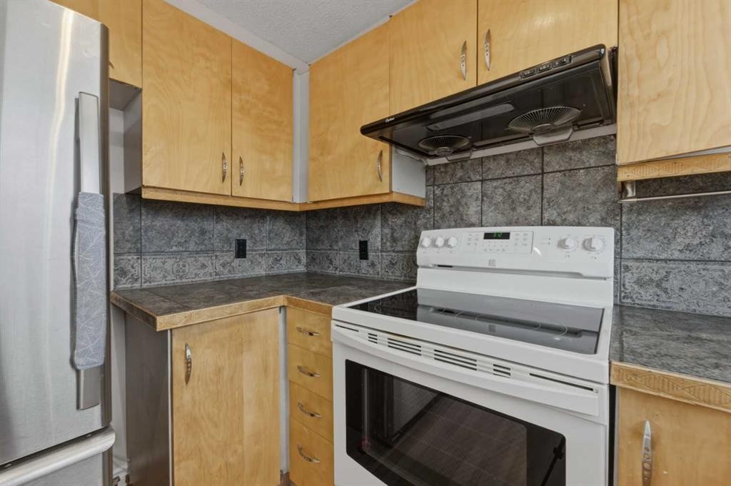 43 Martindale Court Ne, Calgary, AB - Indoor Photo Showing Kitchen