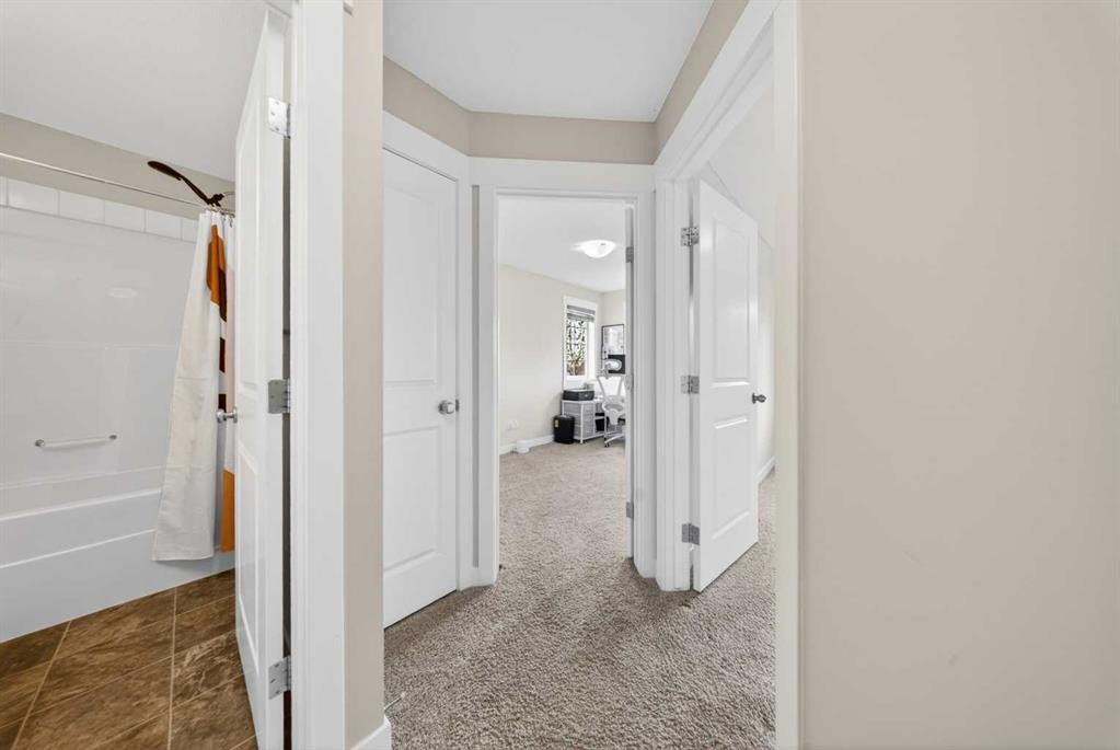212 Cascades Pass, Chestermere, AB - Indoor Photo Showing Other Room