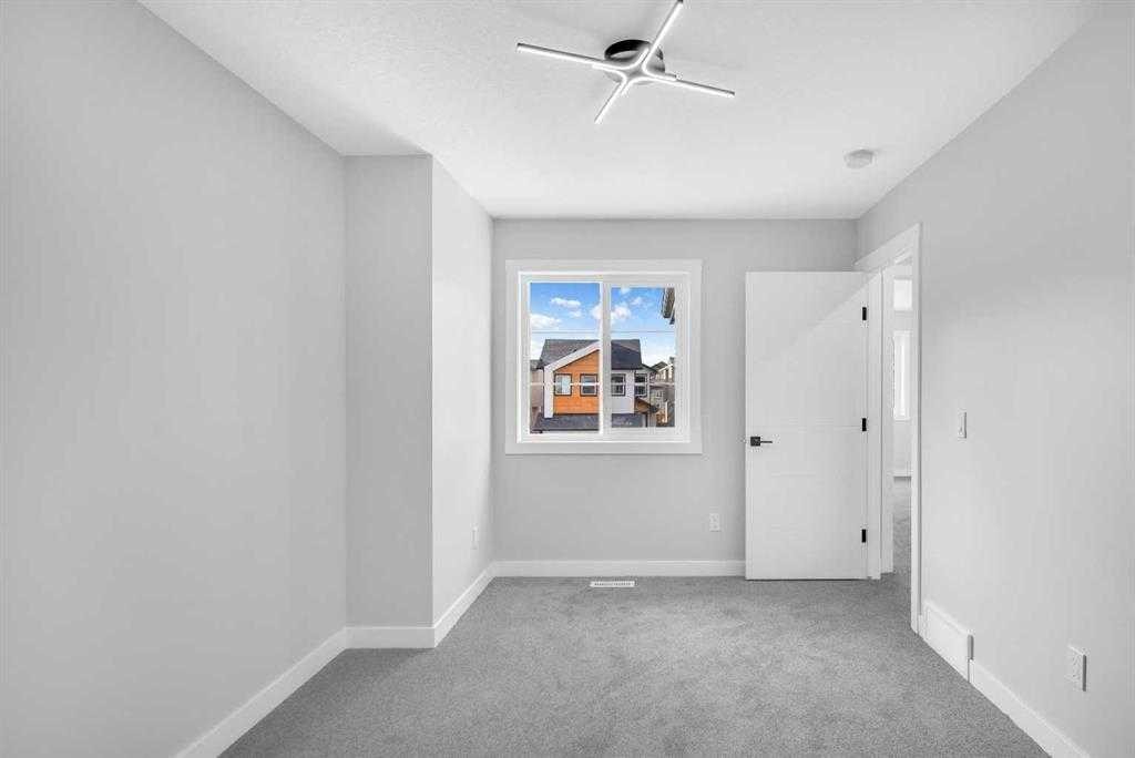 110 Saddlepeace Crescent Ne, Calgary, AB - Indoor Photo Showing Other Room
