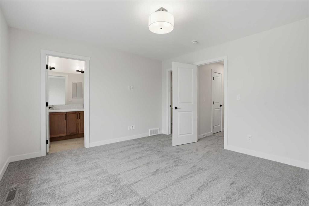 80 Buffaloberry Manor Se, Calgary, AB - Indoor Photo Showing Other Room