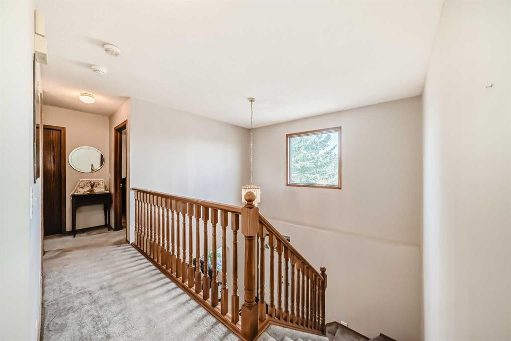 219 Hawkstone Close Nw, Calgary, AB - Indoor Photo Showing Laundry Room