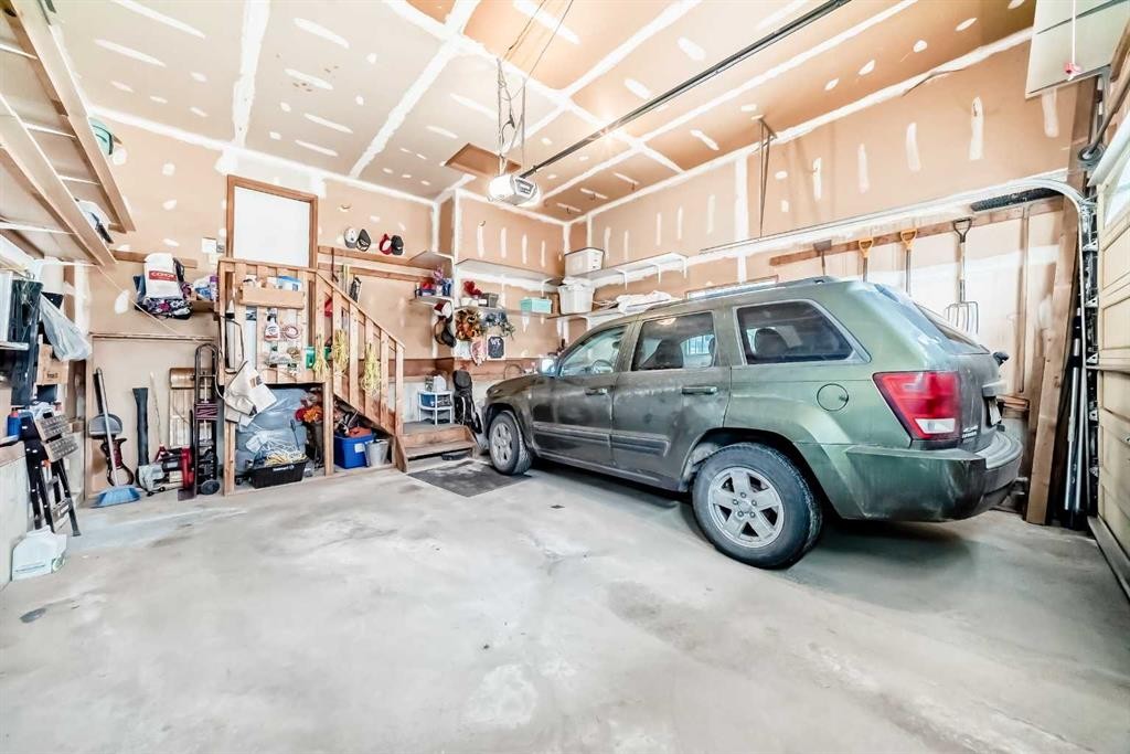 219 Hawkstone Close Nw, Calgary, AB - Indoor Photo Showing Garage