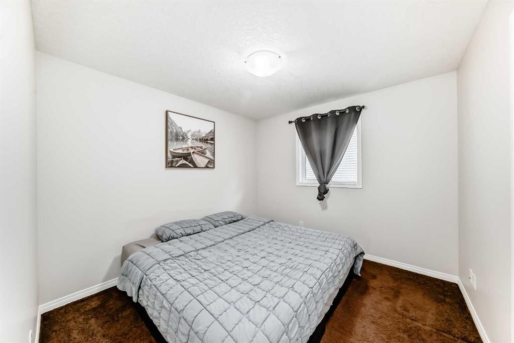 795 New Brighton Drive Se, Calgary, AB - Indoor Photo Showing Bedroom