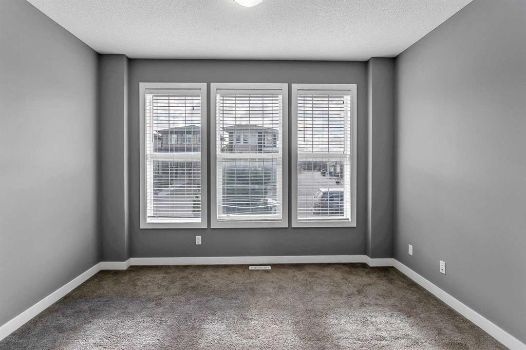 23 Marquis Link Se, Calgary, AB - Indoor Photo Showing Other Room