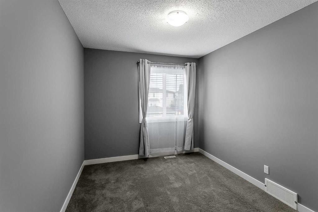 23 Marquis Link Se, Calgary, AB - Indoor Photo Showing Other Room