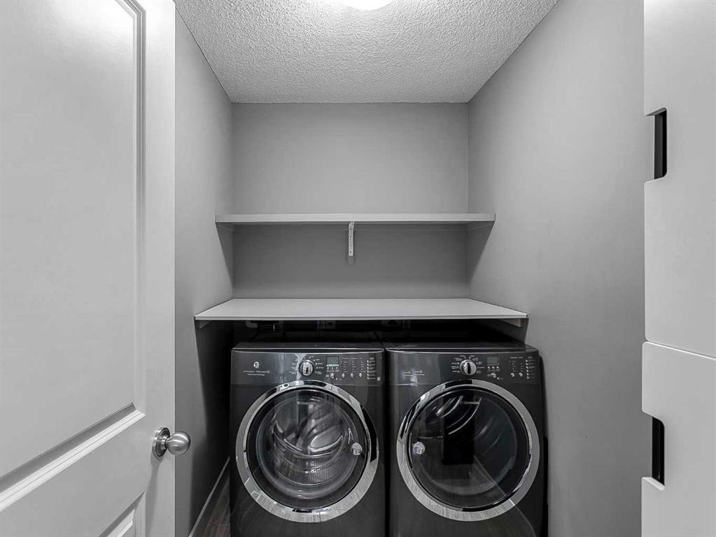 23 Marquis Link Se, Calgary, AB - Indoor Photo Showing Laundry Room