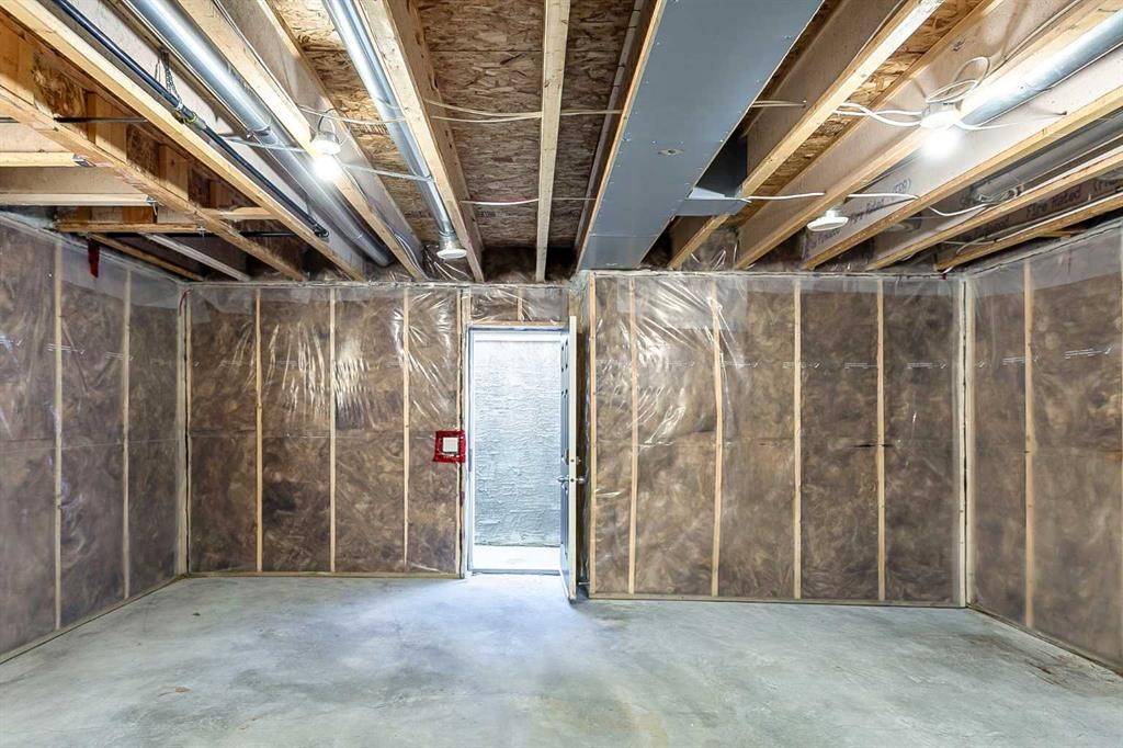 23 Marquis Link Se, Calgary, AB - Indoor Photo Showing Basement
