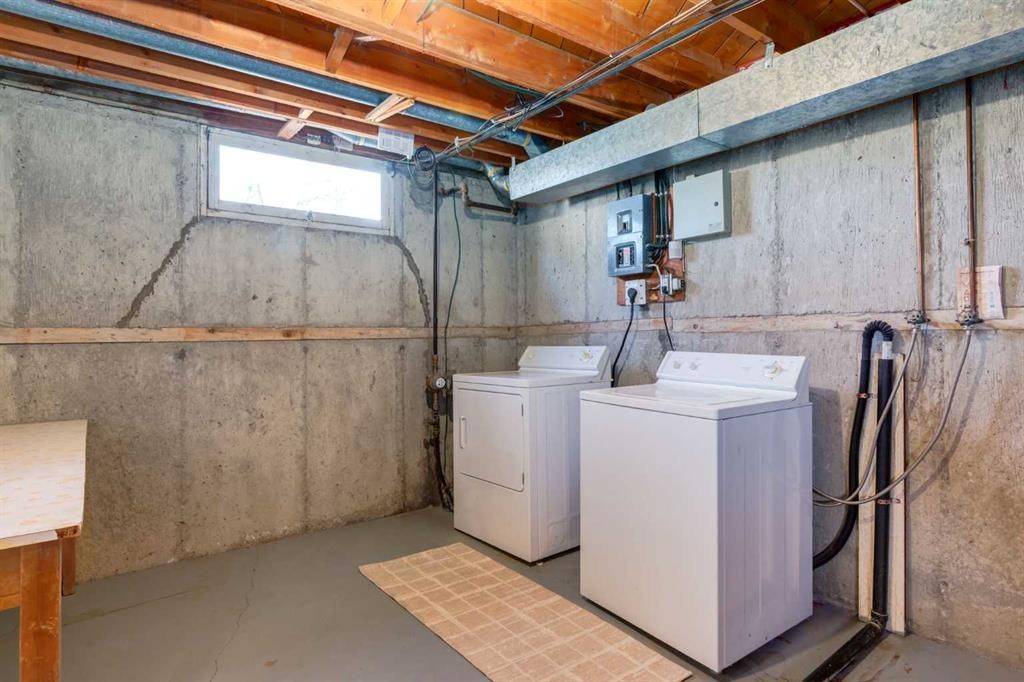 126 Winston Drive Sw, Calgary, AB - Indoor Photo Showing Laundry Room