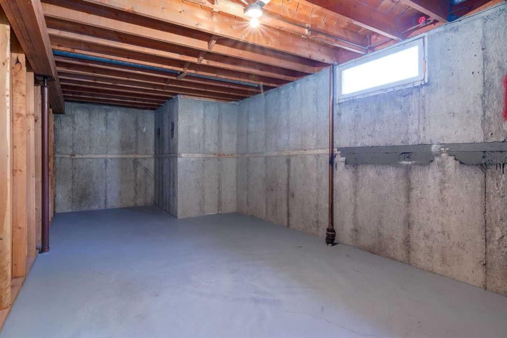 126 Winston Drive Sw, Calgary, AB - Indoor Photo Showing Basement