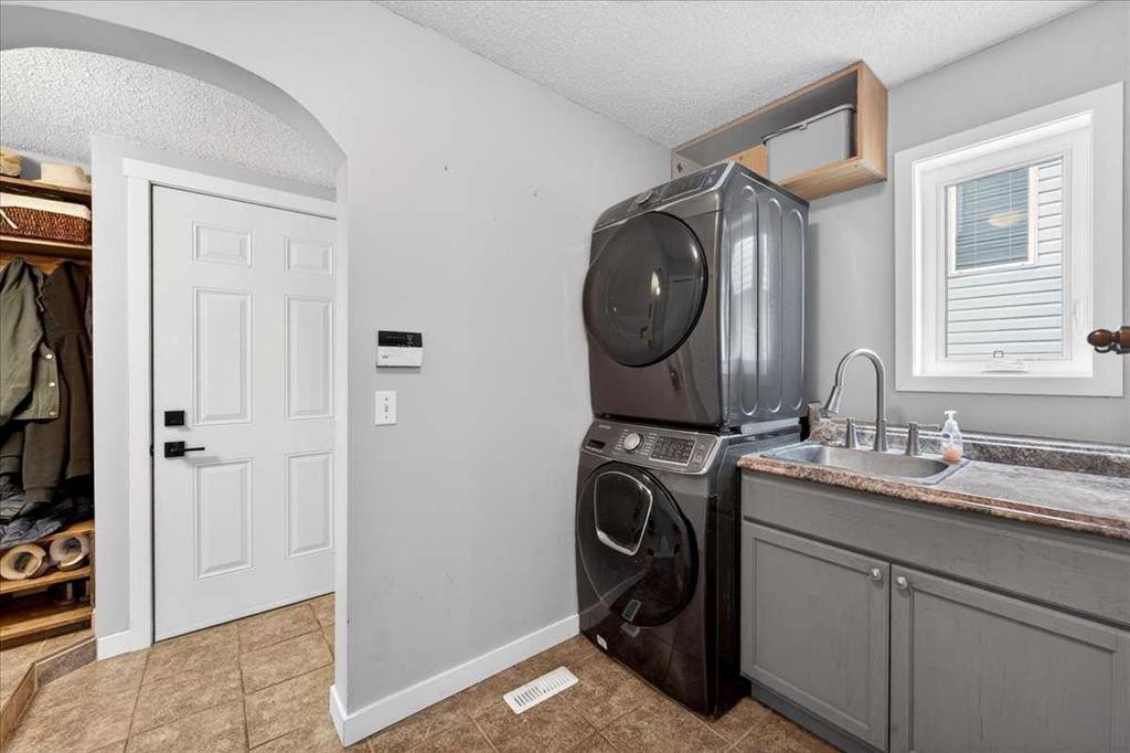 127 Hidden Ranch Terrace Nw, Calgary, AB - Indoor Photo Showing Laundry Room