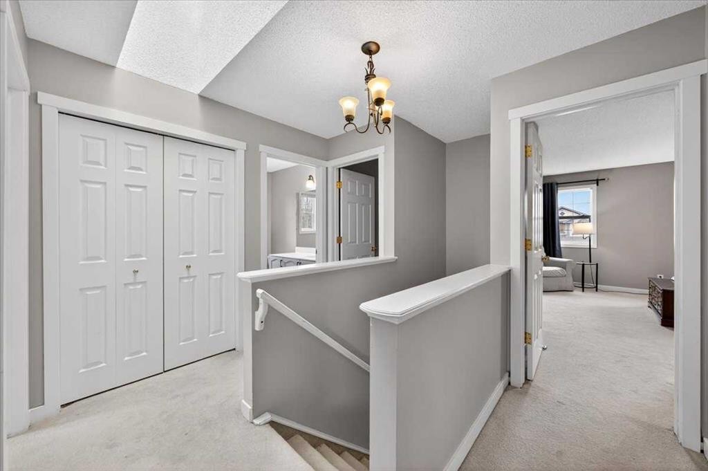 127 Hidden Ranch Terrace Nw, Calgary, AB - Indoor Photo Showing Other Room