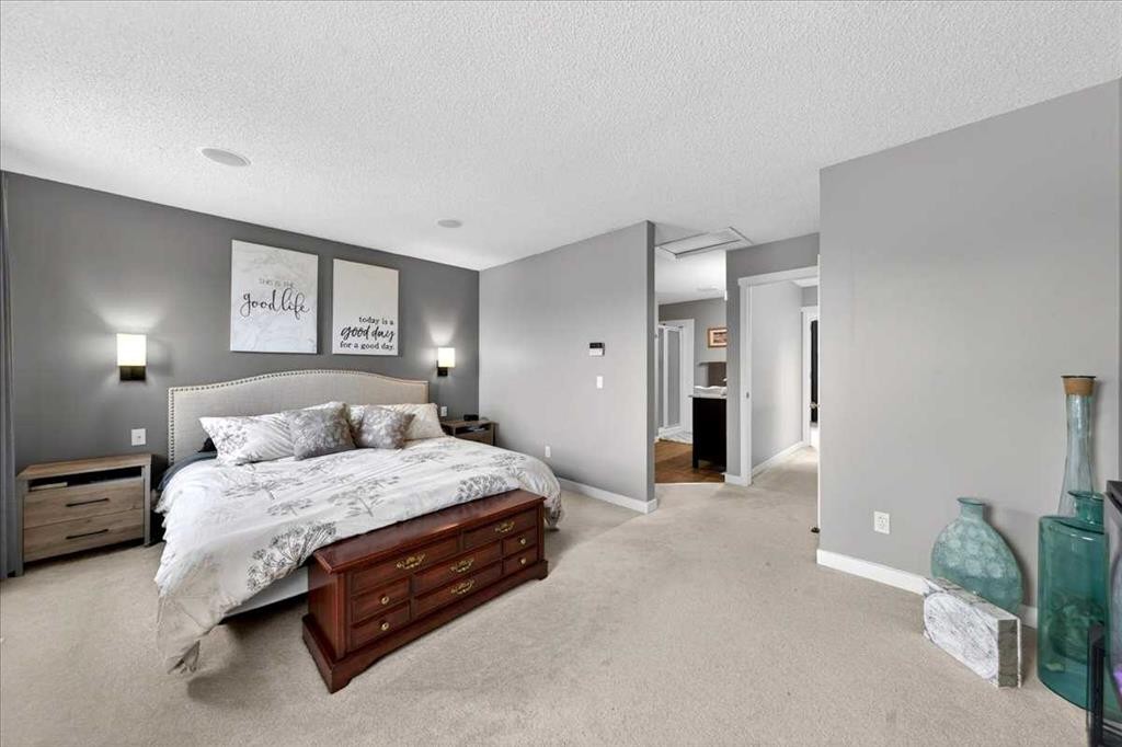 127 Hidden Ranch Terrace Nw, Calgary, AB - Indoor Photo Showing Bedroom