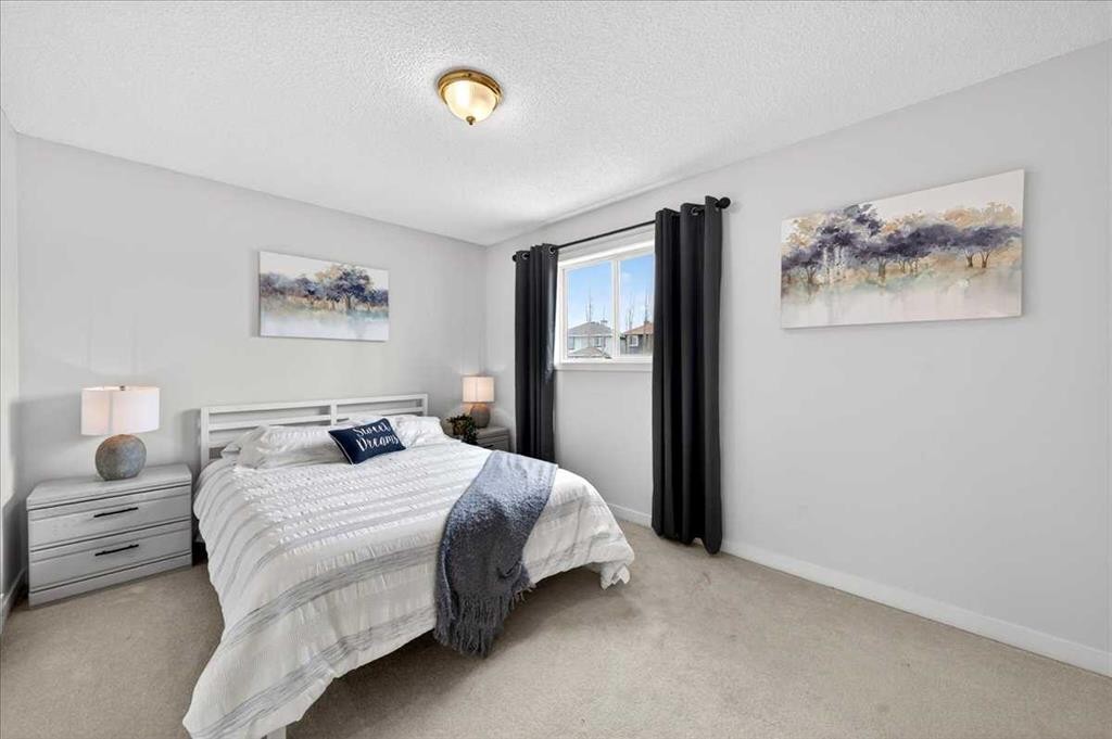 127 Hidden Ranch Terrace Nw, Calgary, AB - Indoor Photo Showing Bedroom