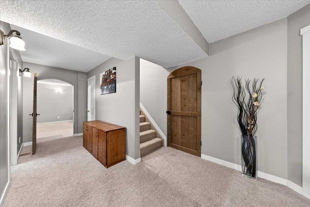 127 Hidden Ranch Terrace Nw, Calgary, AB - Indoor Photo Showing Other Room